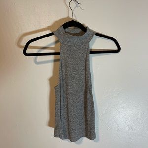 Grey sleeveless turtleneck